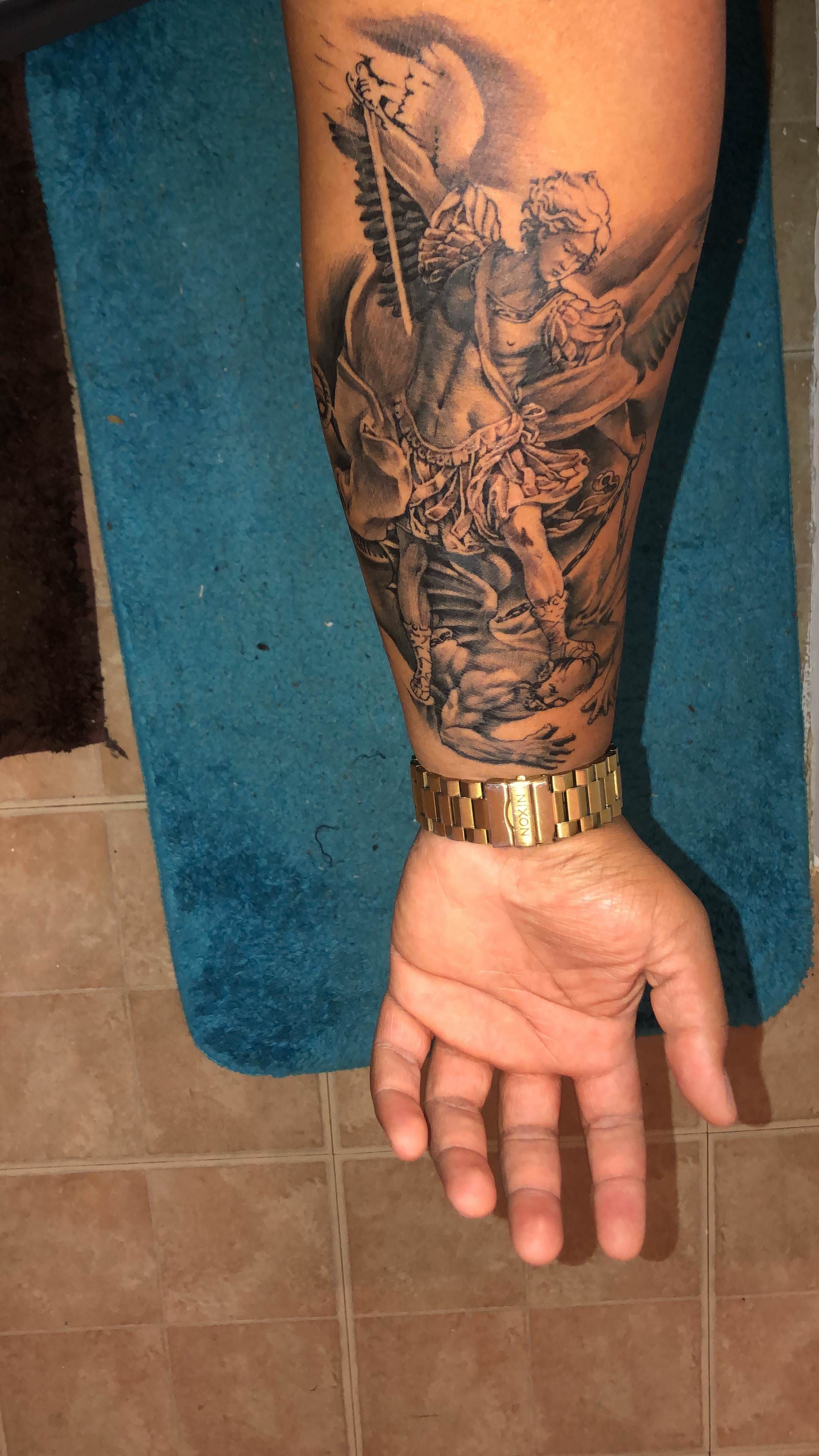 5 Stunning Saint Michael Forearm Tattoo Designs