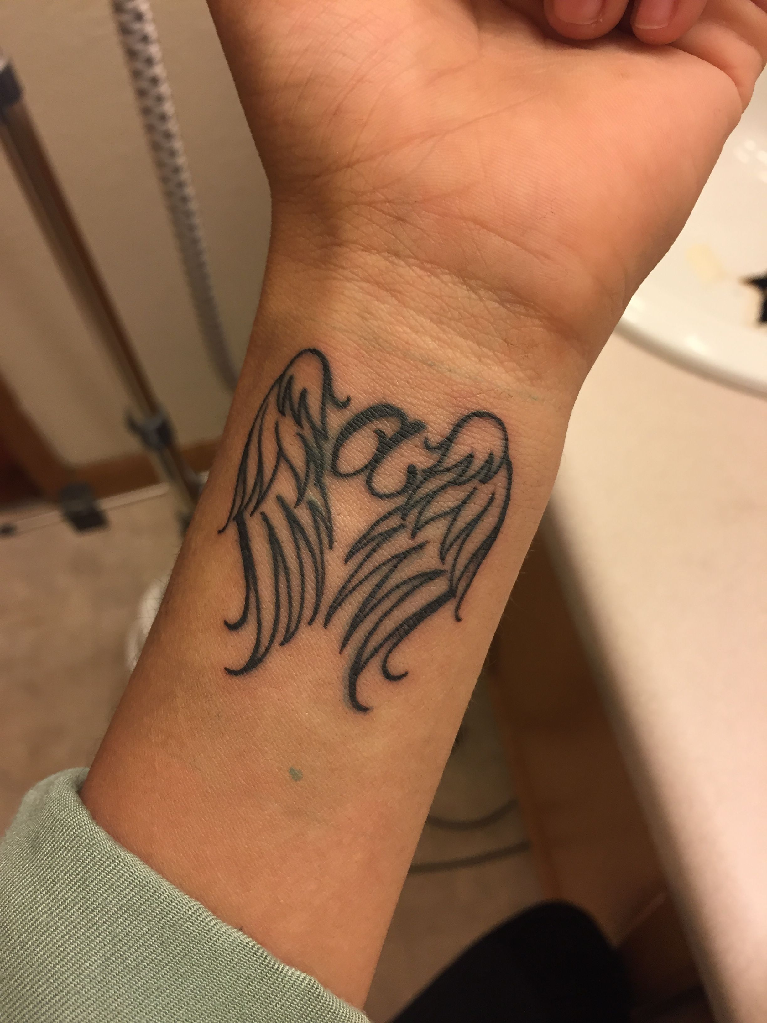 Simple Angel Wing Tattoo Designs