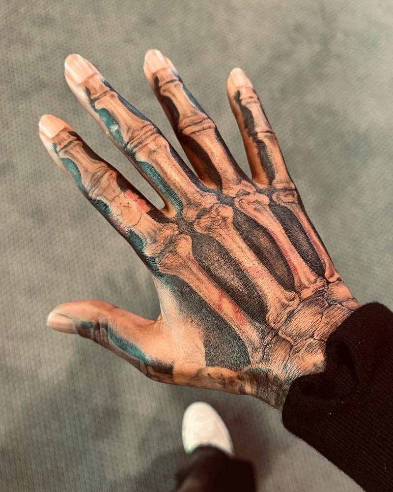 Skeleton Hand Tattooed On Kid Cudi