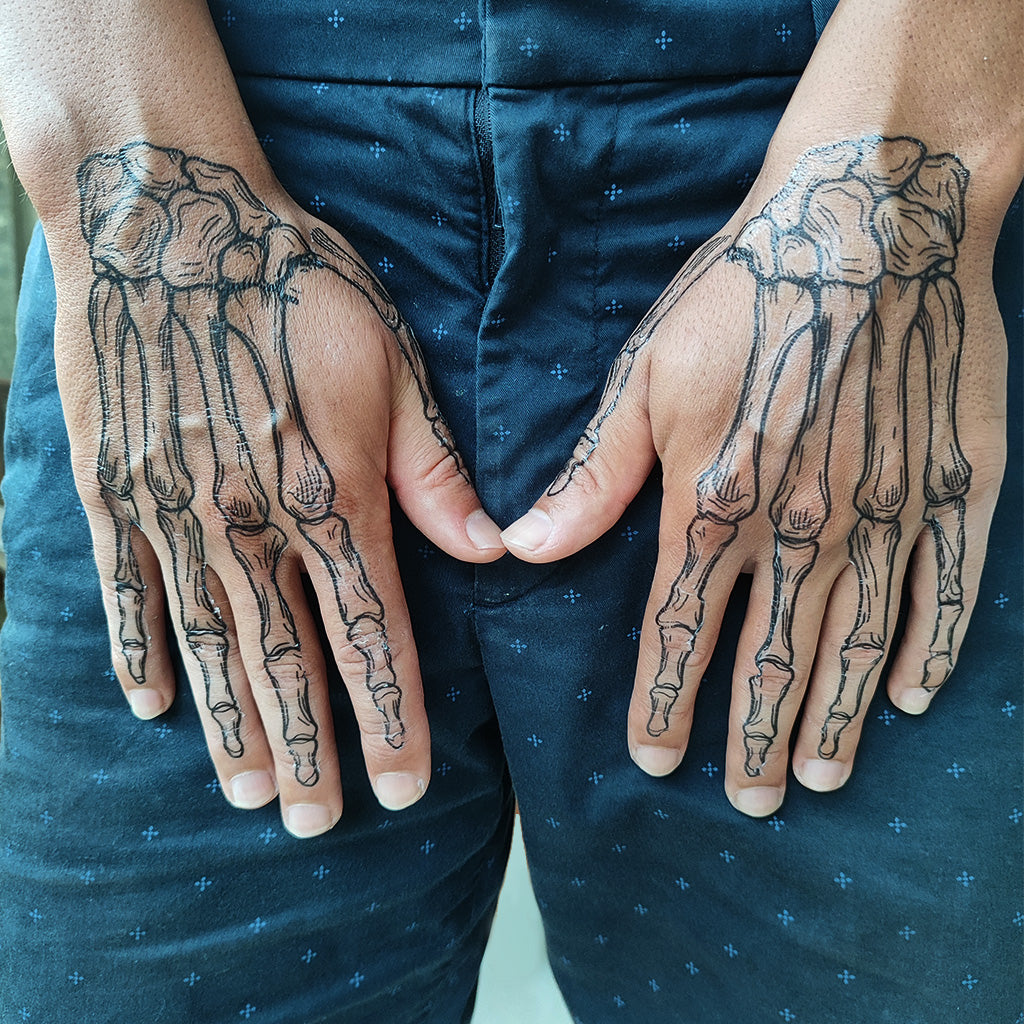 Skeleton Hand Tattoos 50 Terrific Ideas With Meanings 2023 Artofit