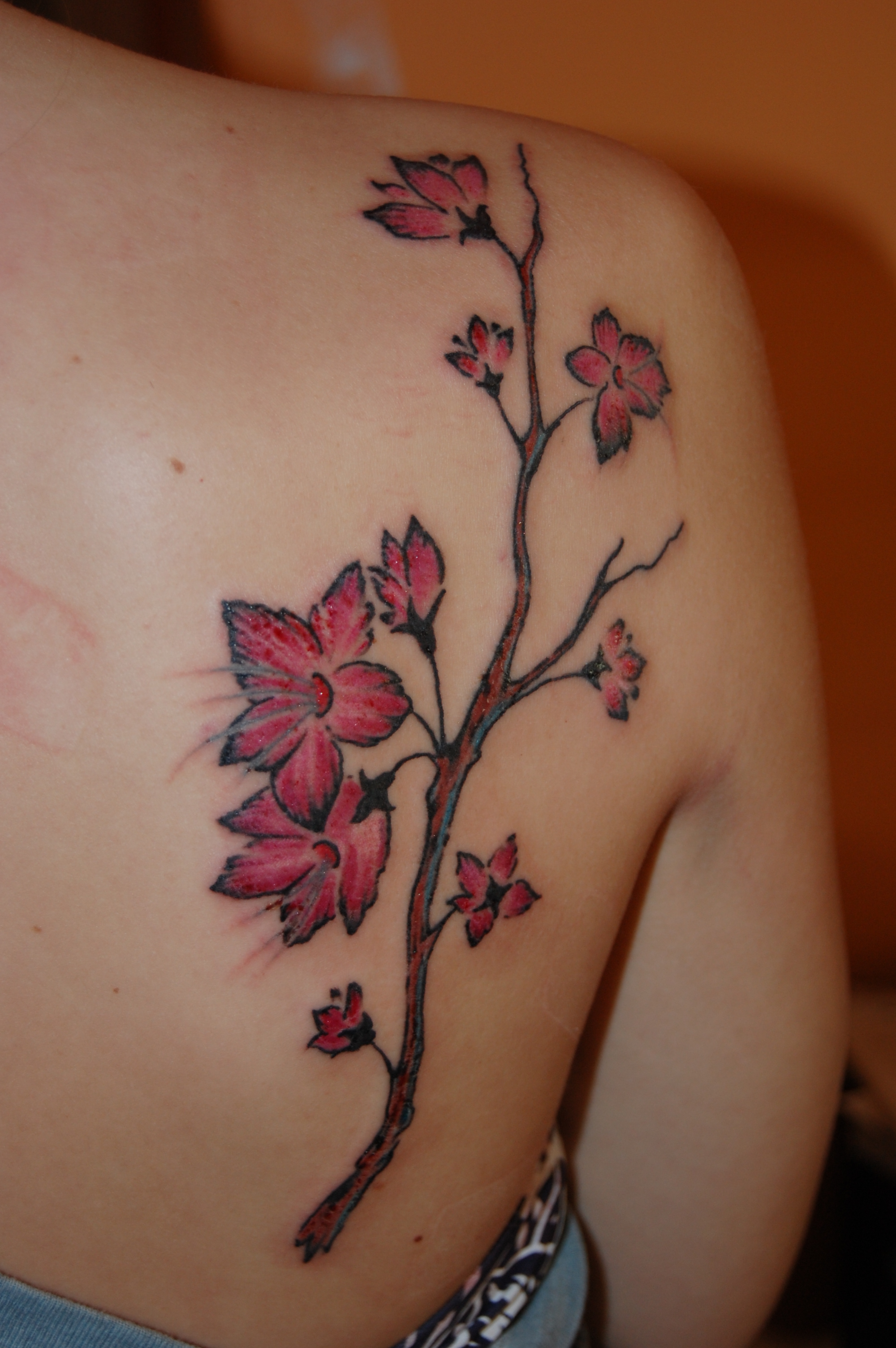 Small Cherry Blossom Tattoo Ideas for Delicate Ink Lovers