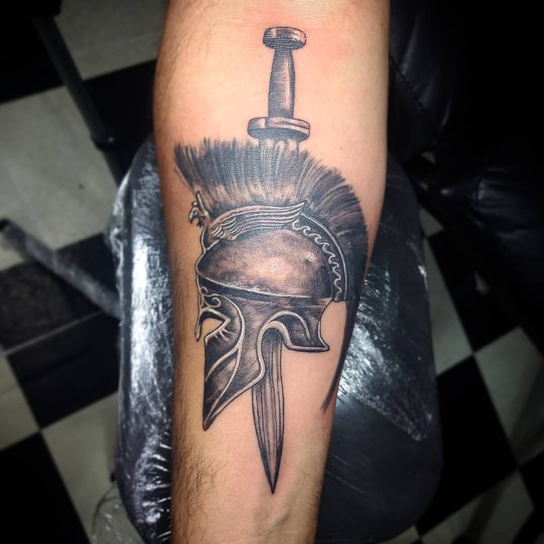 Spartan Helmet And Sword Tattoo