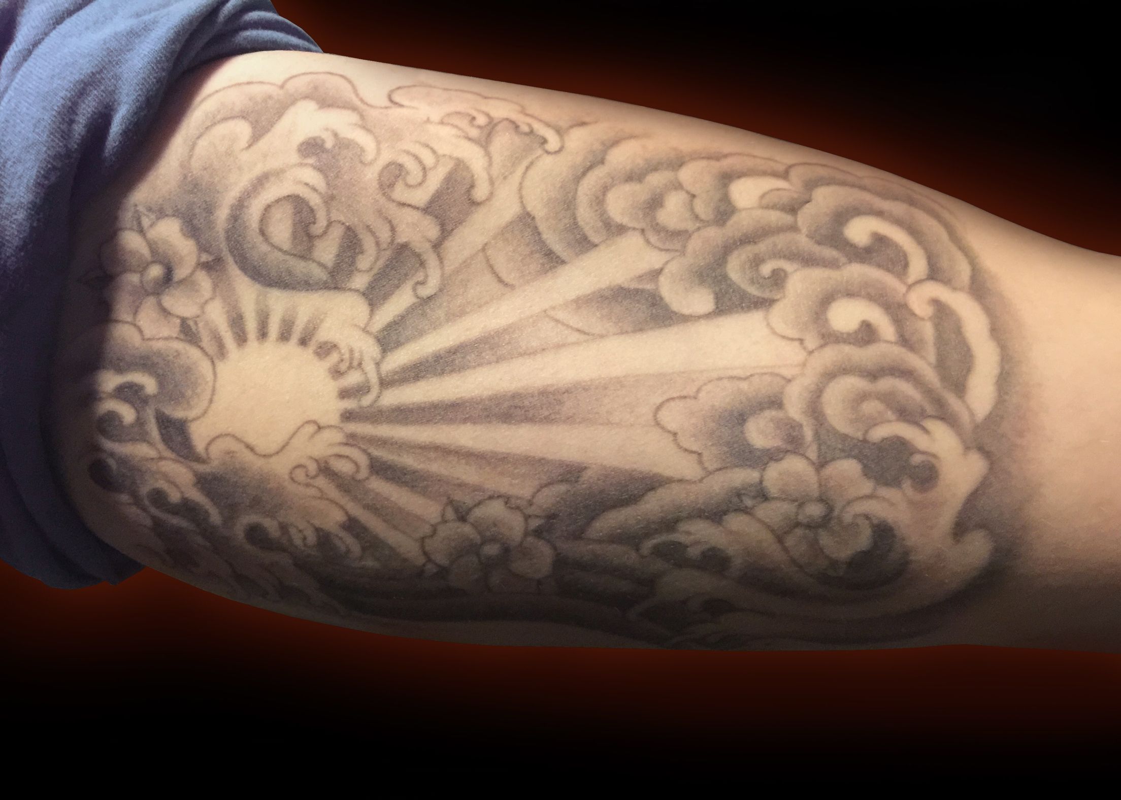 Sun Tattoo Japanese Wave Cloud Black And Grey Bicep Tattoo