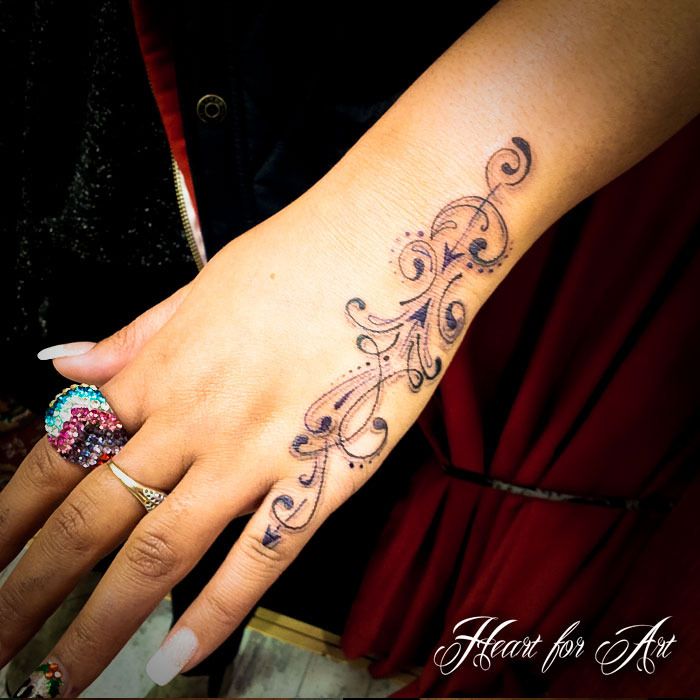 Swirl Tattoo On Girl Left Hand Tattoos Pinterest Swirl Tattoo