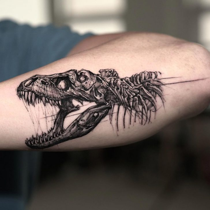 T Rex Skull Tattoo On The Right Inner Arm