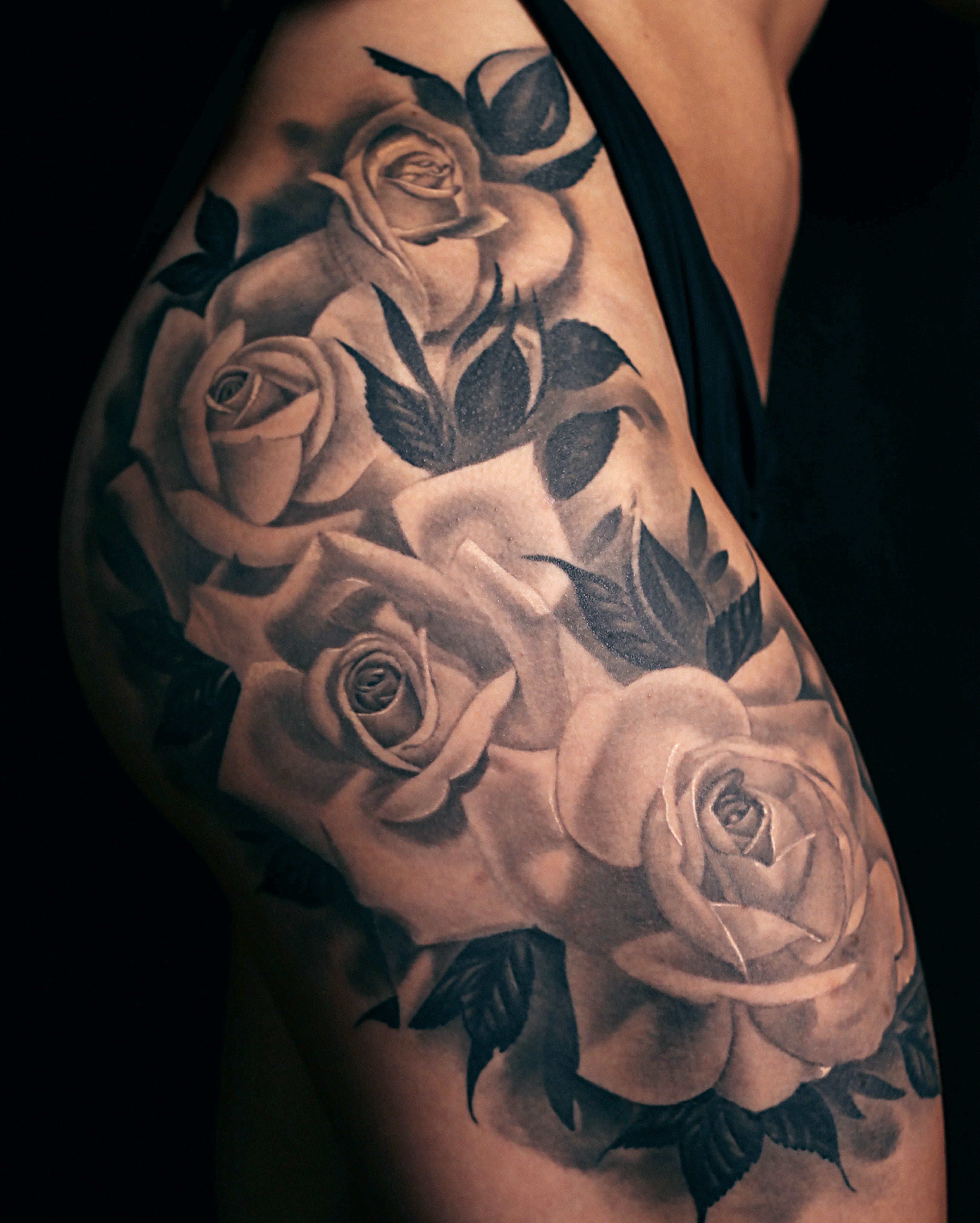 5 Stunning Thigh Tattoo Ideas: Roses Edition