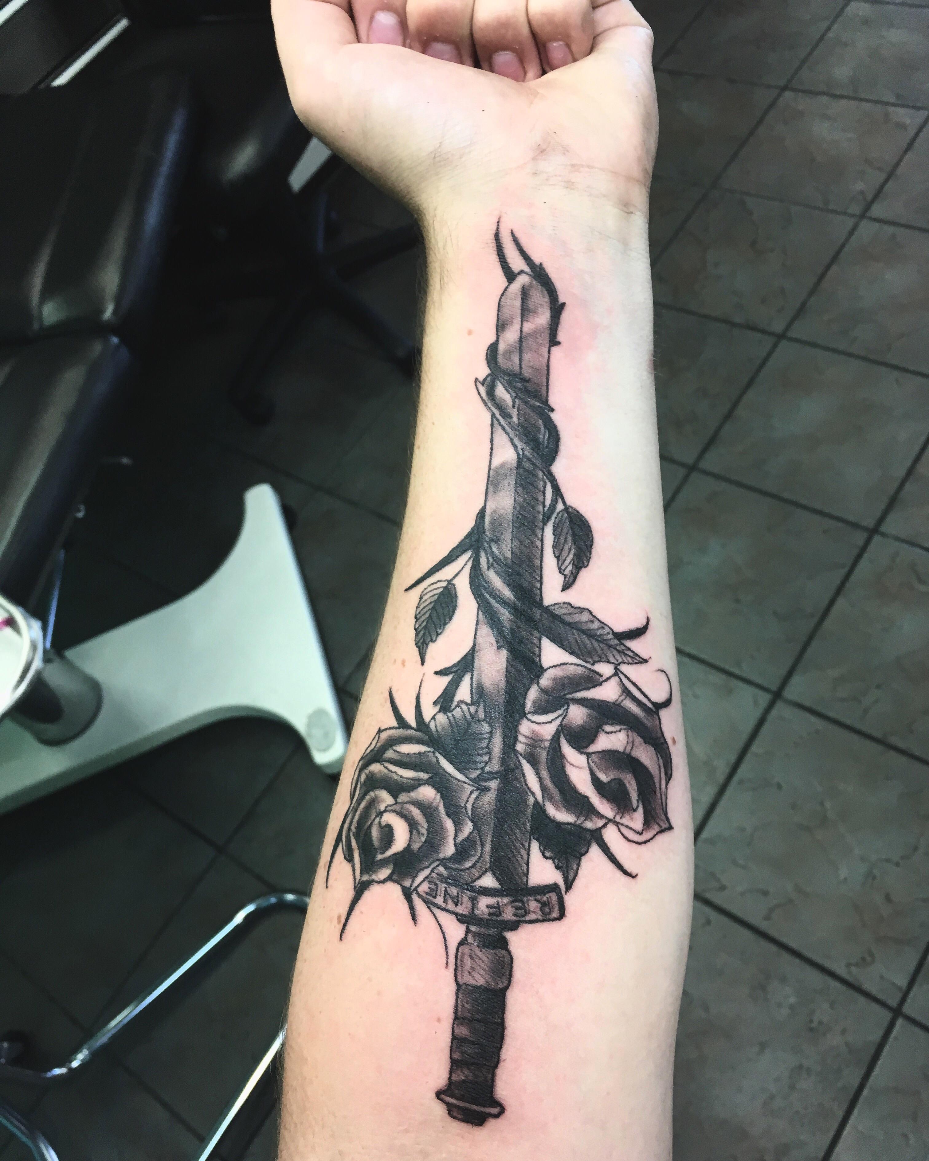 Sword and Roses Tattoo: Meaning and Designs