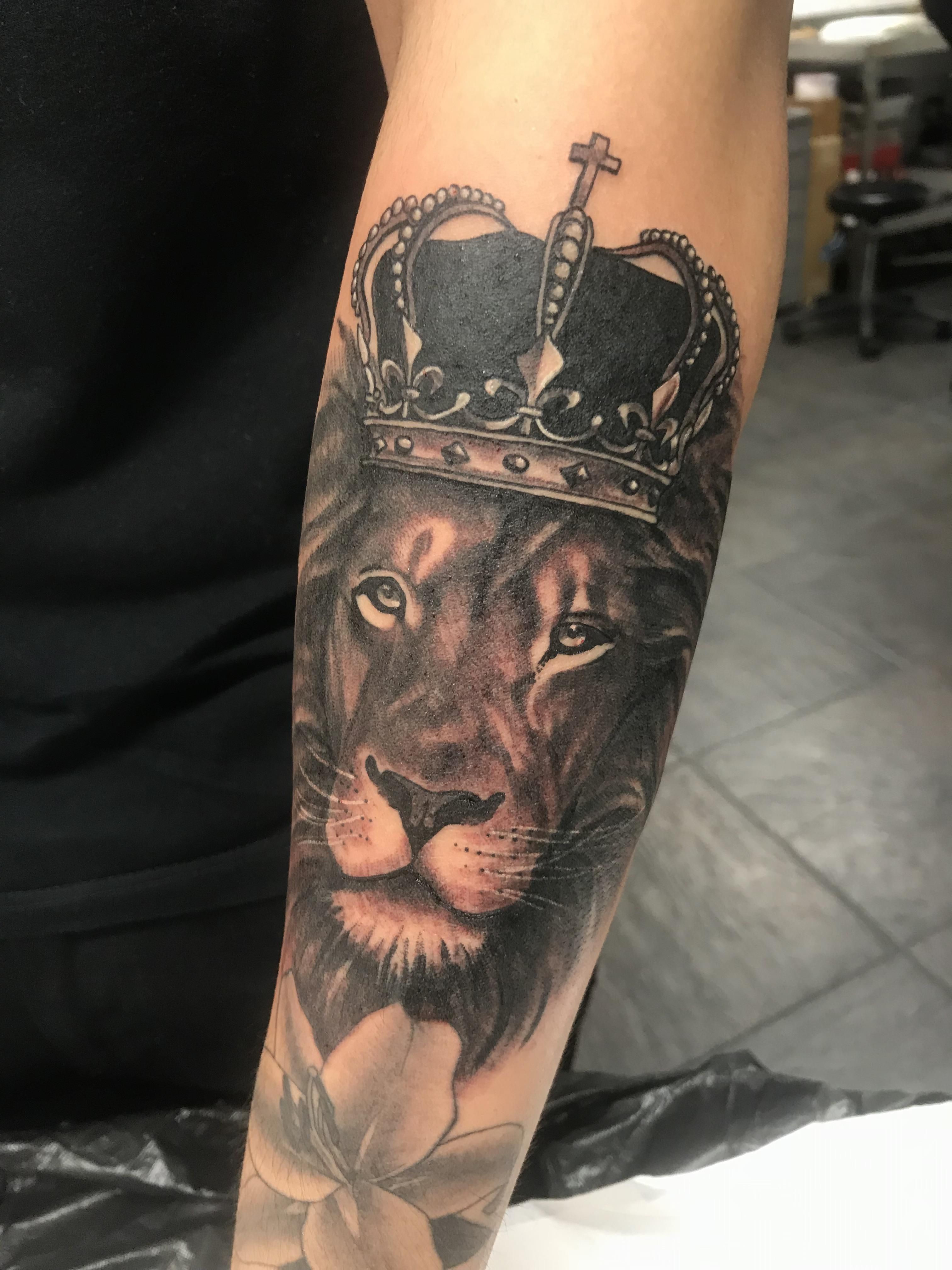 Lion Crown Tattoos: Symbolism and Meaning