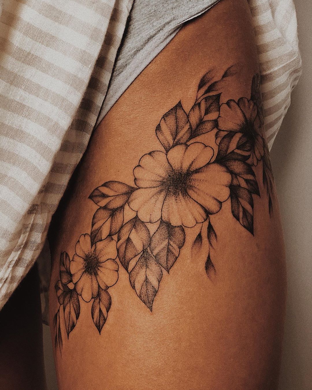 7 Stunning Thigh Tattoo Ideas: Feminine Flowers