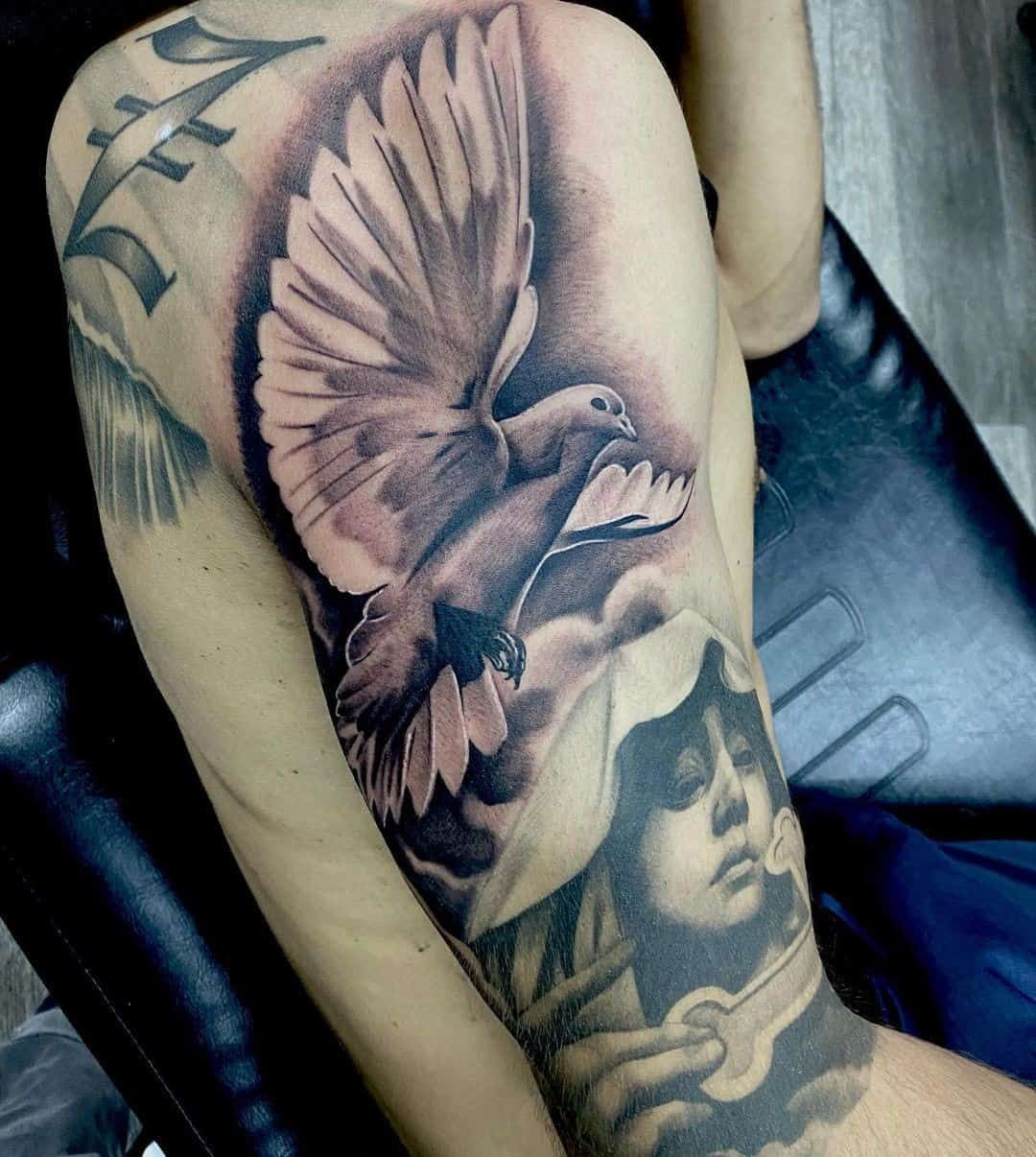 Top 33 Gorgeous Dove Tattoo Design Ideas 2021 Updated Dove Tattoo Design White Dove Tattoos