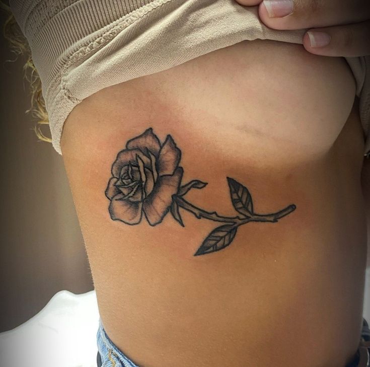 Traditional Rose Tattoo On Rib Cage By Nikki At Ink Boss In Abington