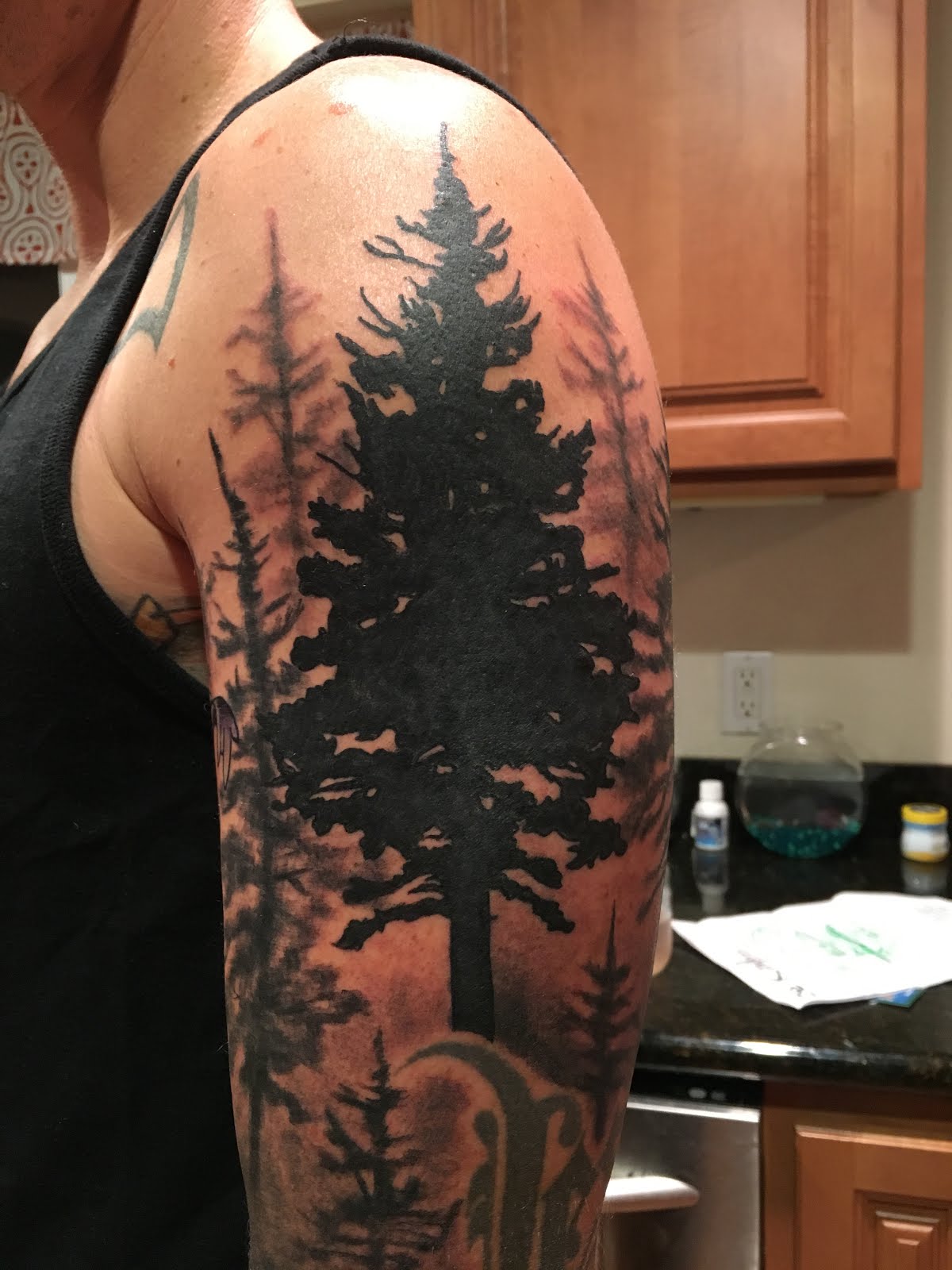 Elegant Tree Tattoos for Your Arm: Symbolism & Designs