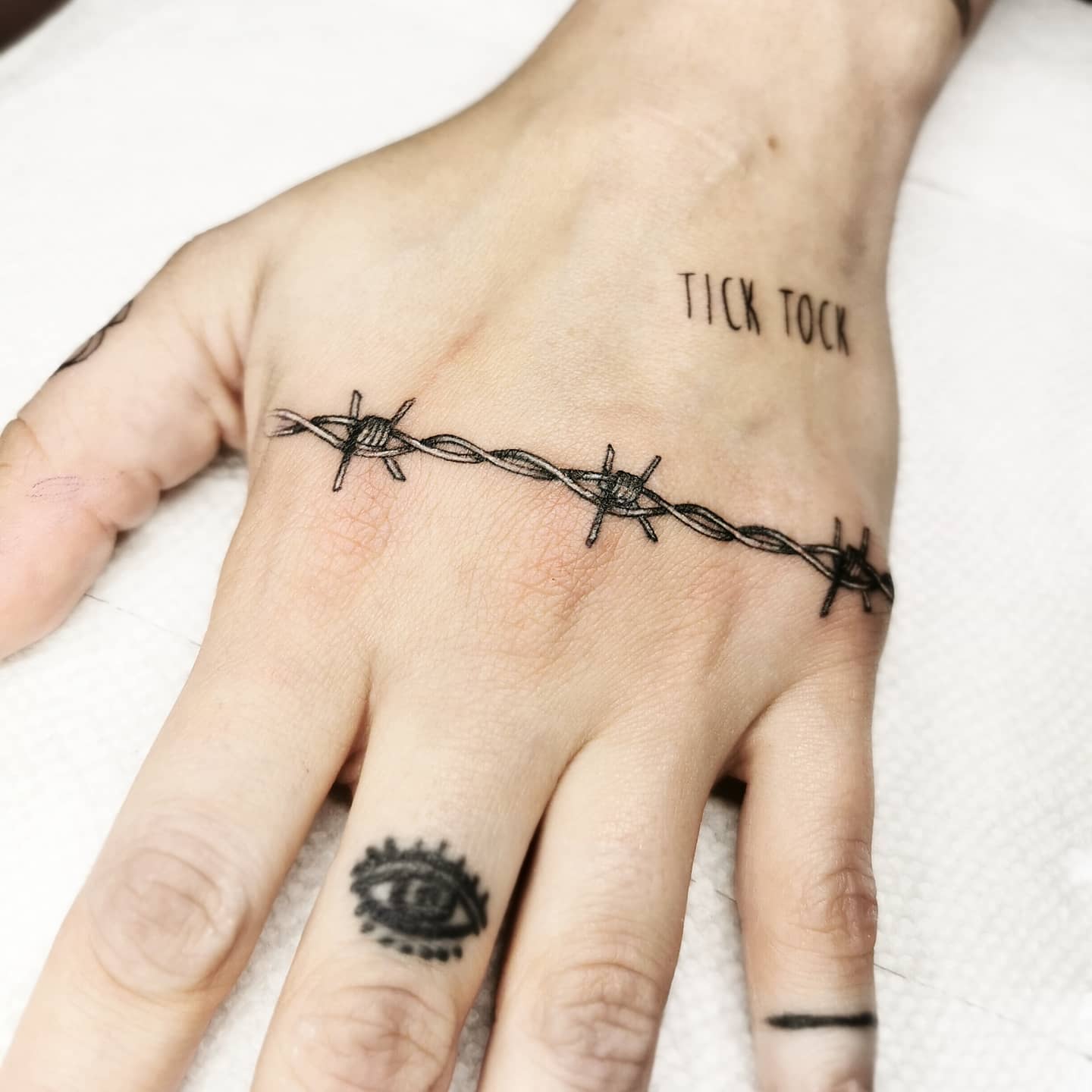 Understanding The Significance And Meaning Of Barbed Wire Tattoos