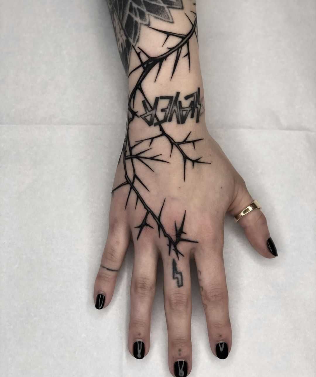 Vine and Thorn Tattoos: Symbolism and Styles Revealed