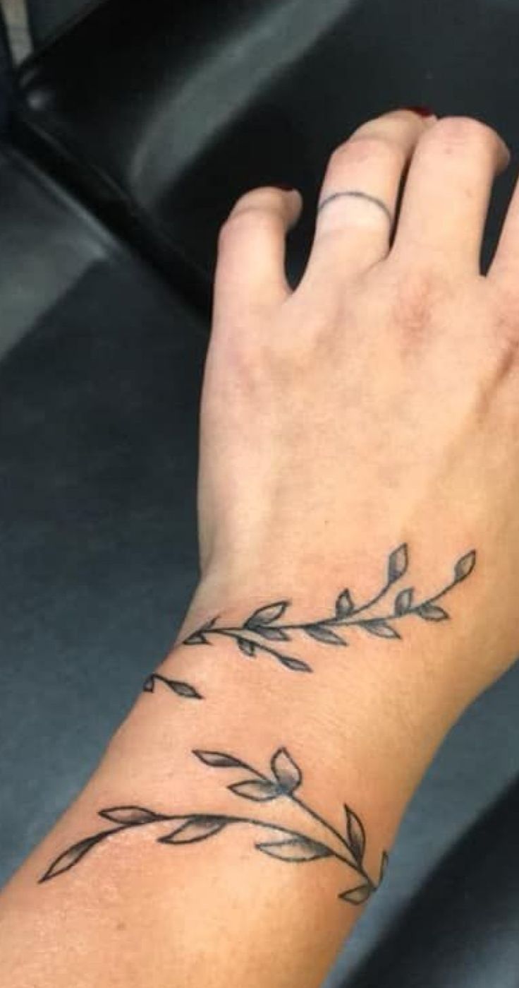 Vine Wrist Tattoo In 2021 Wrap Around Wrist Tattoos Unique Wrist