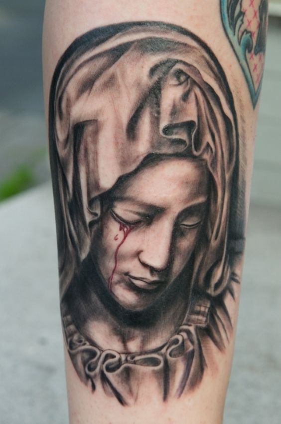 Virgin Mary Tattoo Meaning And Symbolism Fully Explained Tattooclue Com