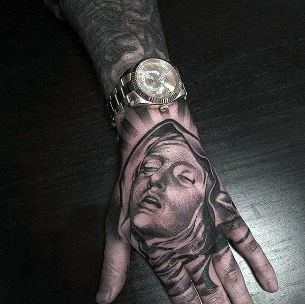 5 Stunning Virgin Mary Hand Tattoo Designs