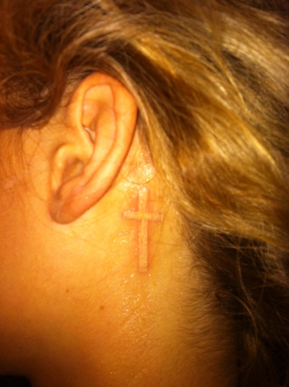 White Cross Tattoos Behind Ear