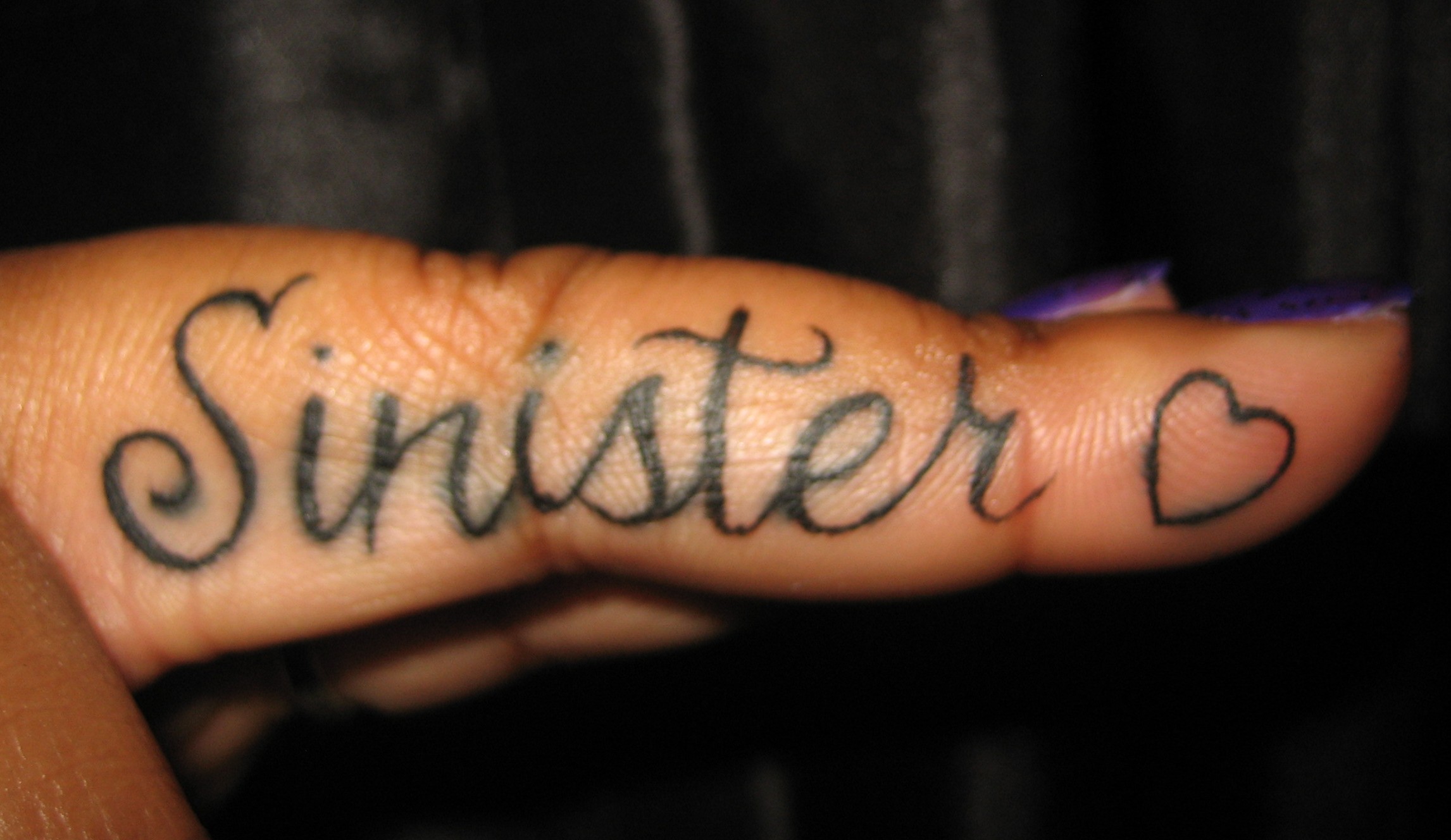 15 Creative and Meaningful Finger Tattoo Words