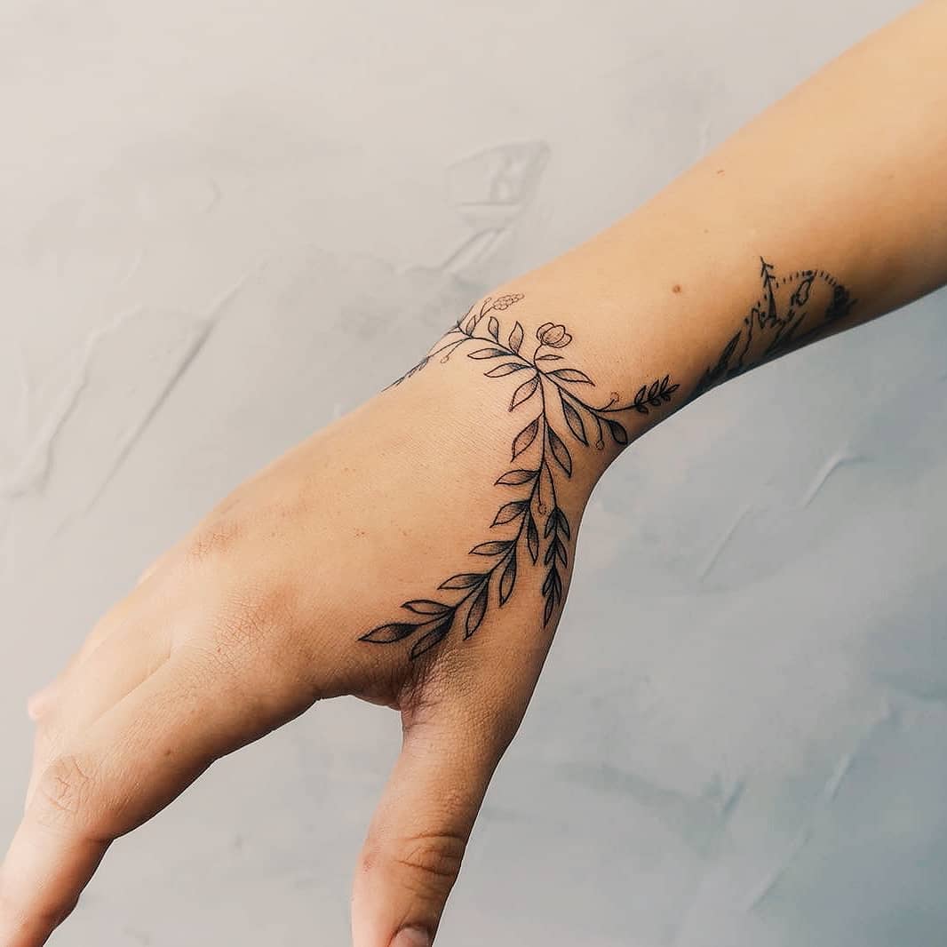 Stunning Wrap Around Wrist Tattoo Designs to Inspire You