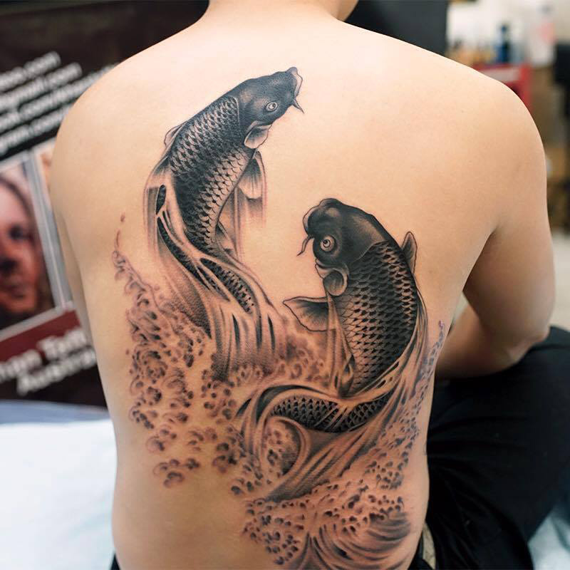 Yin Yang Koi Carp Tattoo: Symbolism and Designs